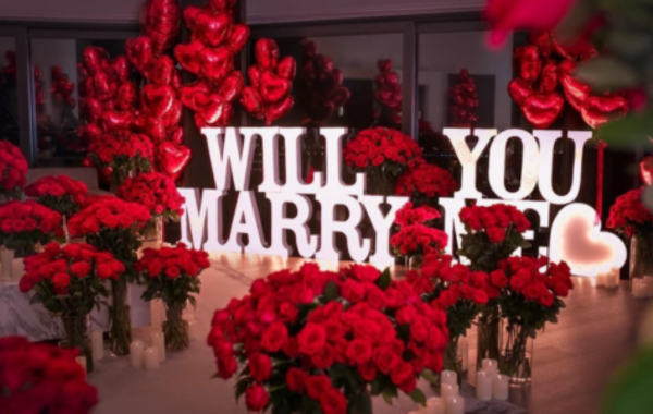 Romantic proposal setup with marquee letters at VR Celebrations